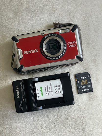 Pentax Optio W80 12.1 MP Digital Camera Bundle - Red Orange