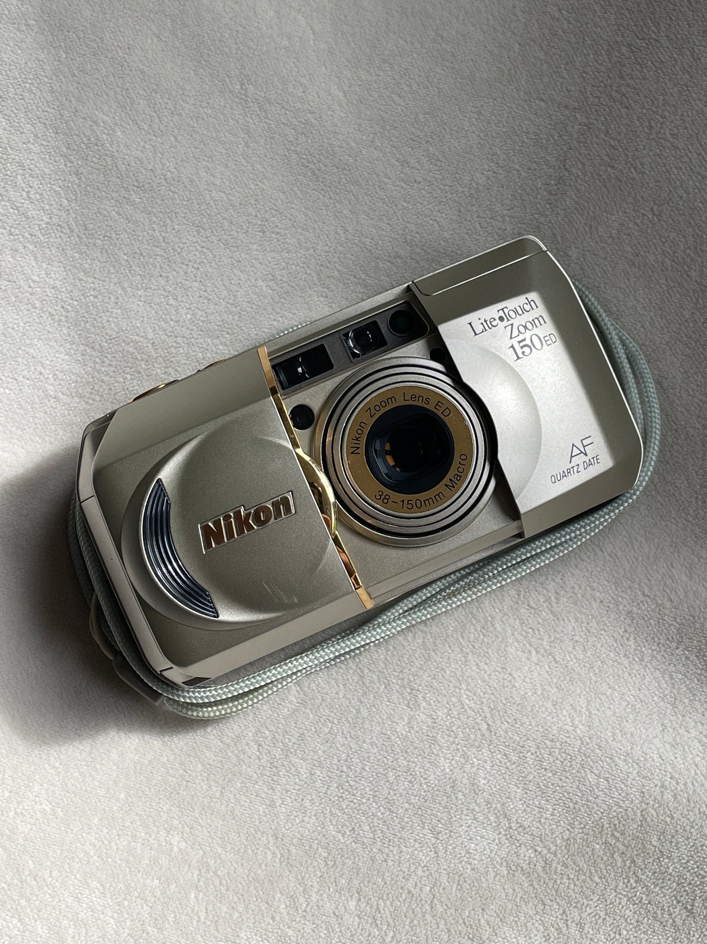 Nikon Lite-Touch Zoom 150 ED AF Quartz Date 35mm Film Camera Bundle - Gold Trim