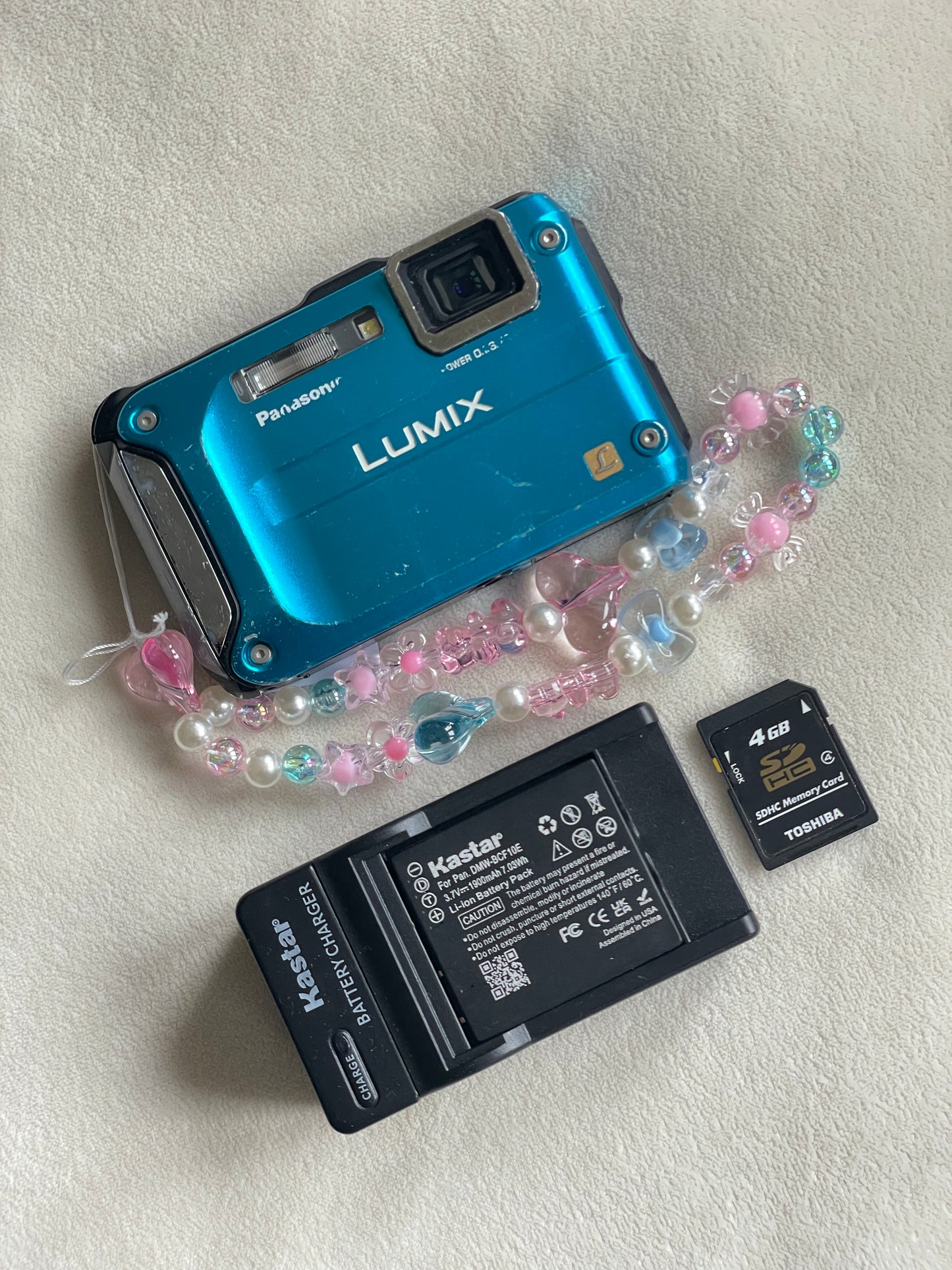 Panasonic Lumix DMC-TS3 12.1 MP Digital Camera Bundle - Blue