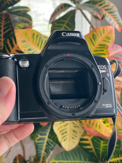 Canon EOS Rebel X S Quartz Date 35mm Film Camera Bundle with Sigma 35-135mm f/4-5.6 lens