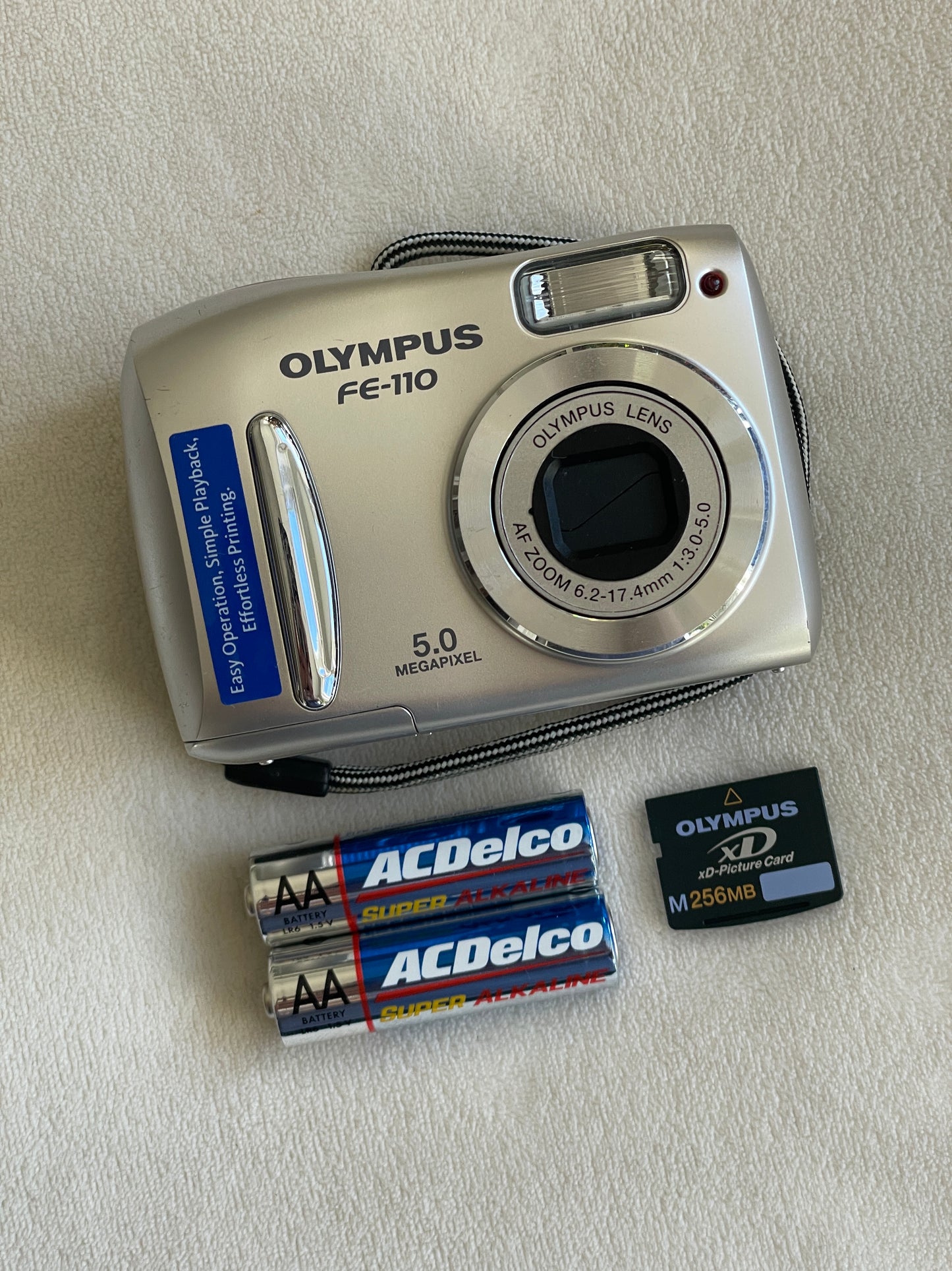 Olympus FE-110 5.0 MP Digital Camera Bundle - Silver - In Box