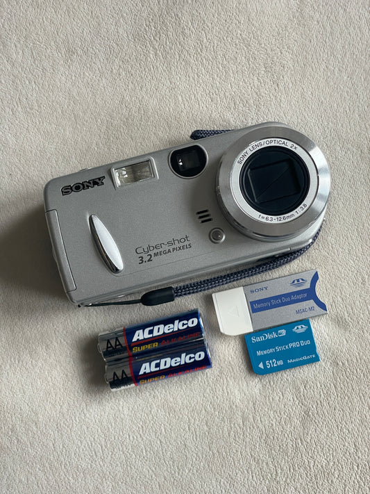 Sony CyberShot DSC-P52 3.2 MP Digital Camera Bundle - Silver