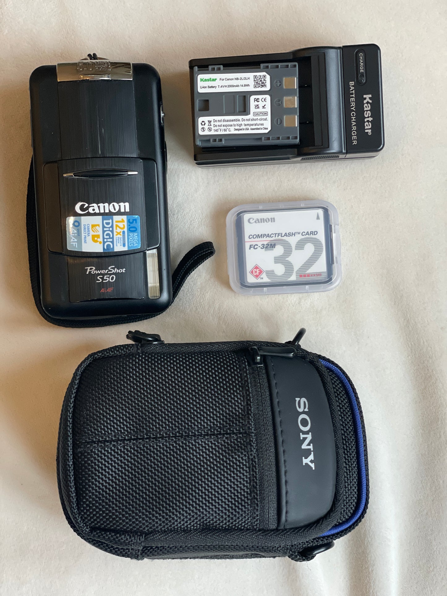 Canon PowerShot S50 5.0 MP Digital Camera Bundle - Black