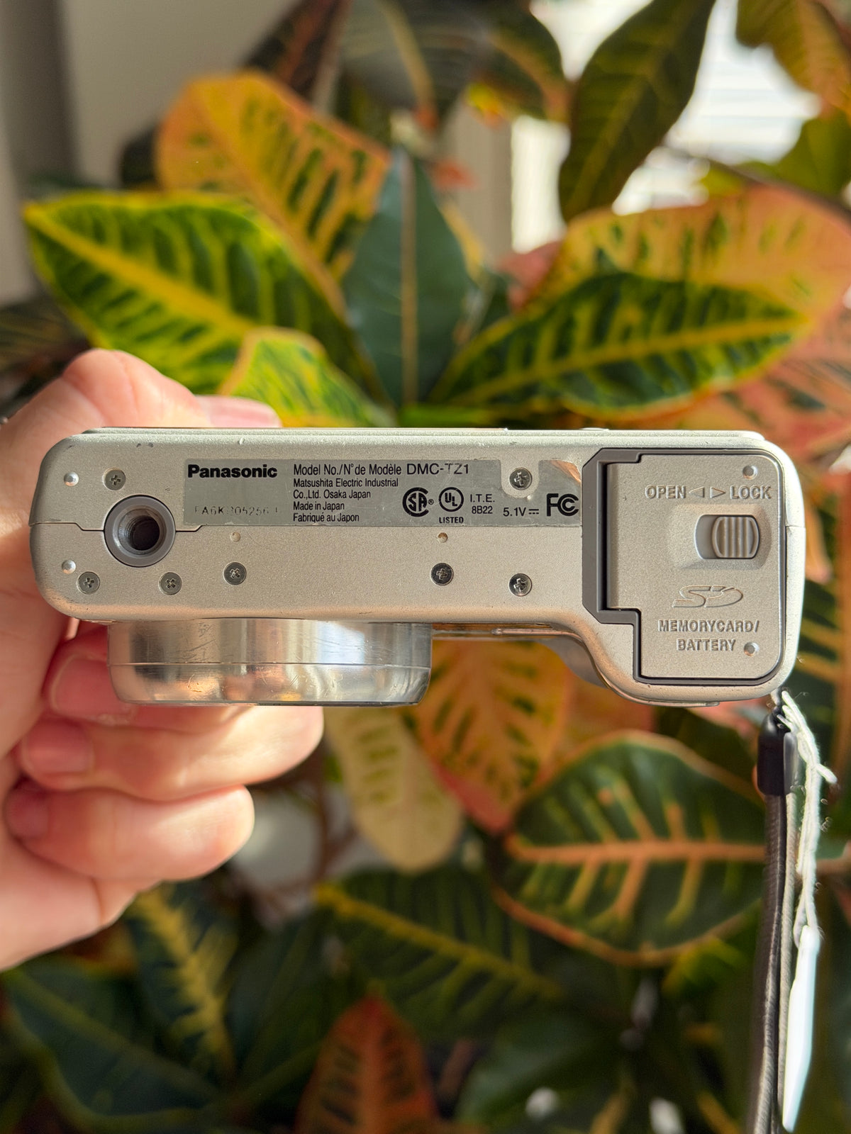 Panasonic Lumix DMC-TZ1 digital camera bottom view