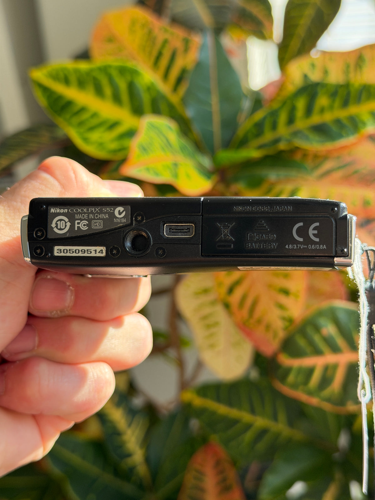Nikon Coolpix S52 digital camera bottom view