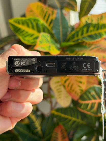 Nikon Coolpix S52 digital camera bottom view